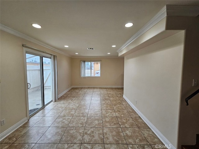 tiled empty room featuring ornamental molding