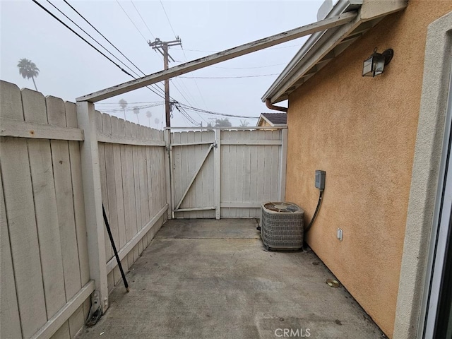 view of patio with central AC unit