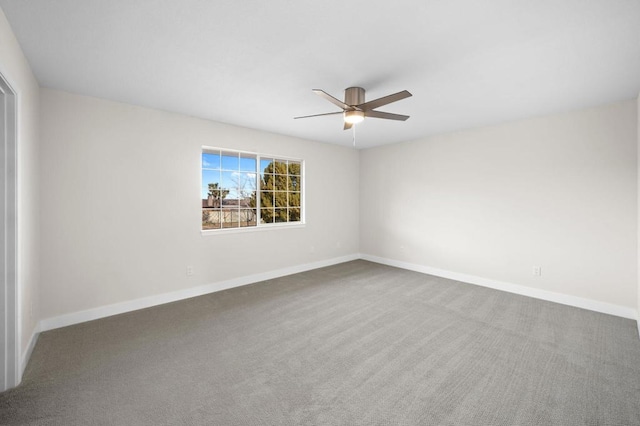 unfurnished room with carpet flooring and ceiling fan