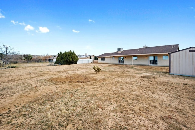 view of yard with a storage unit