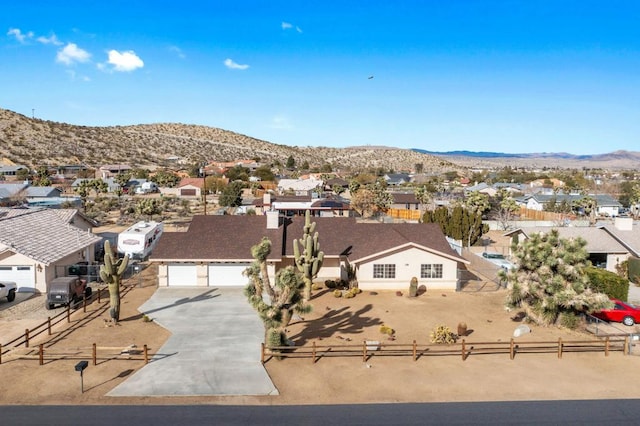 drone / aerial view featuring a mountain view