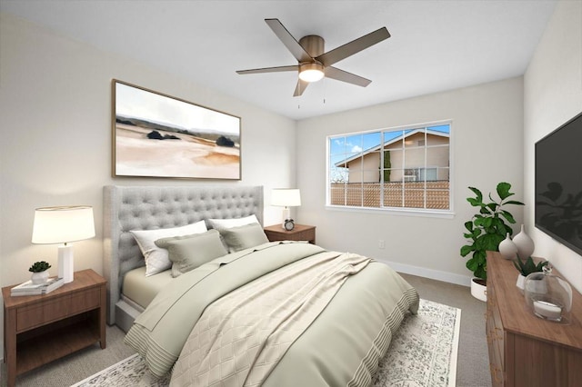 bedroom with ceiling fan and carpet floors