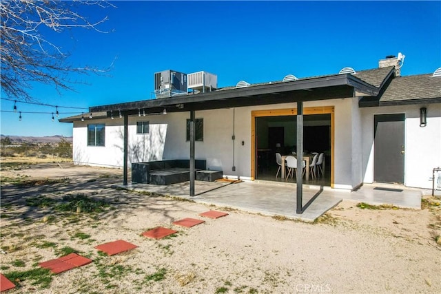 rear view of house featuring a patio area