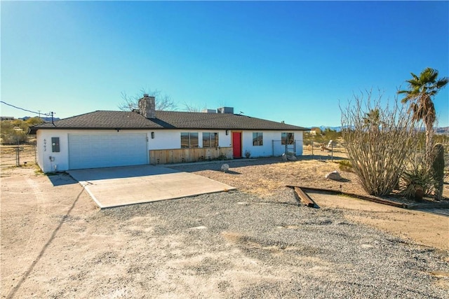 single story home with a garage