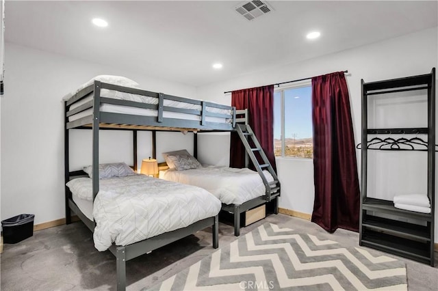 bedroom with concrete floors