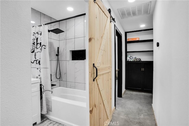 bathroom with shower / tub combo and concrete floors