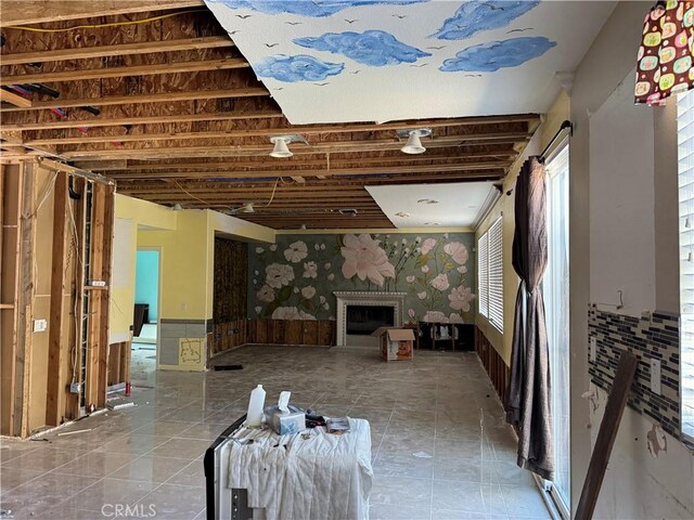 4810 Swallowtail Rd, Hemet, CA 92545 - unfurnished living room featuring a fireplace