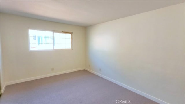 spare room with carpet flooring