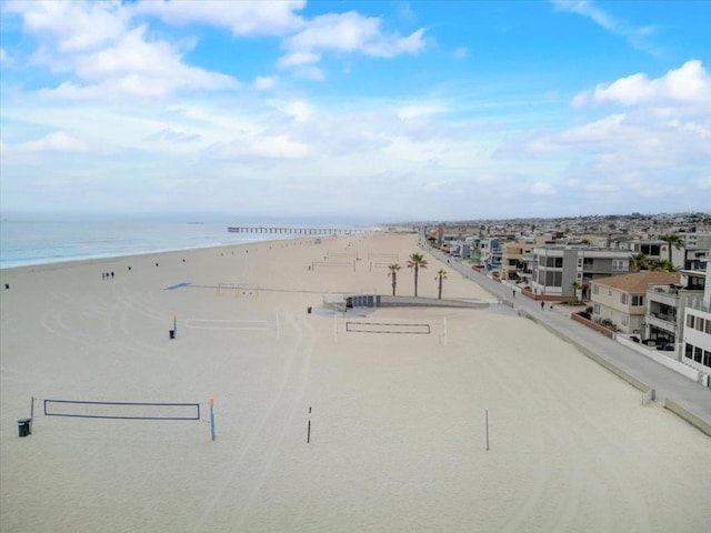 view of water feature with a beach view