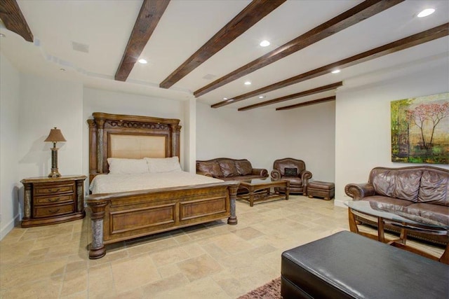 bedroom with beam ceiling