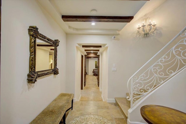 hallway with beamed ceiling