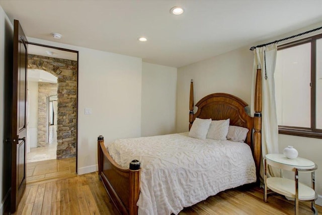 bedroom with light hardwood / wood-style flooring