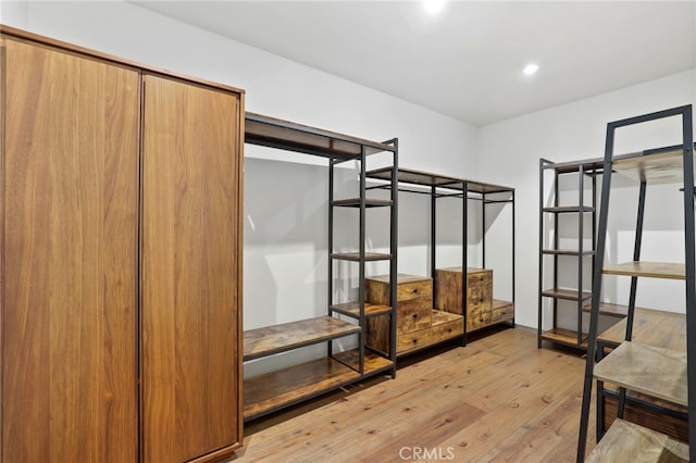 unfurnished bedroom featuring light wood-type flooring