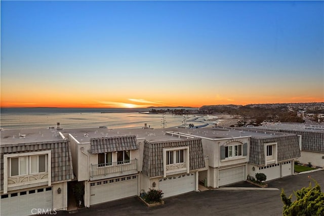 exterior space with a water view