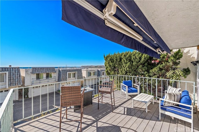 wooden deck featuring an outdoor hangout area