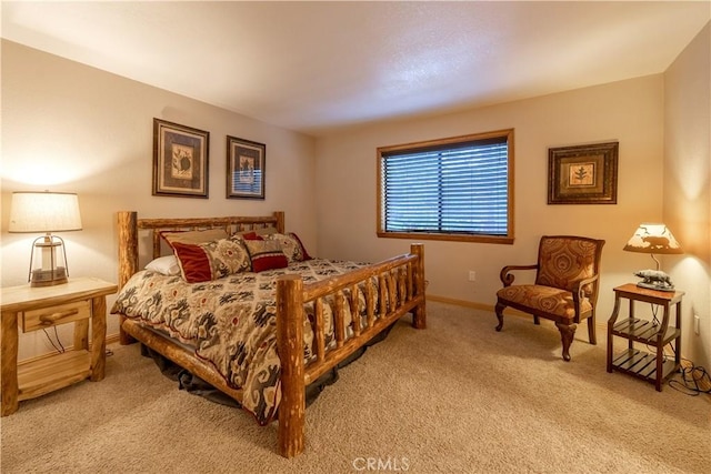 bedroom with light carpet