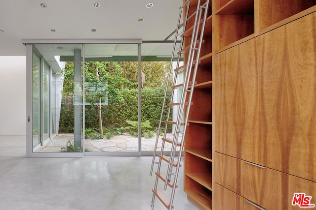 entryway featuring a wall of windows