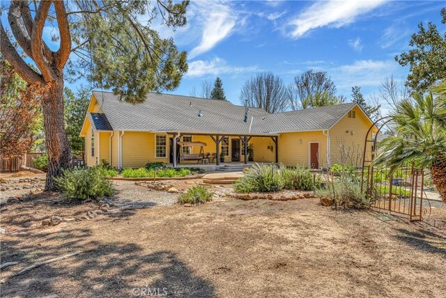 back of property with a patio area