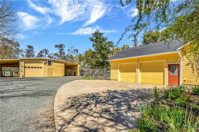 exterior space featuring a carport