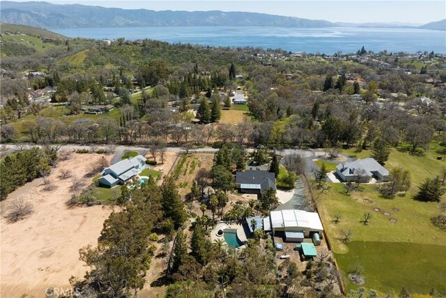 bird's eye view featuring a water and mountain view