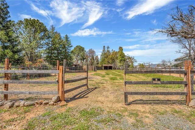 view of gate featuring a rural view