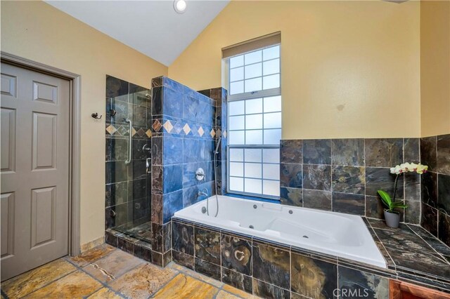 bathroom with plus walk in shower and vaulted ceiling