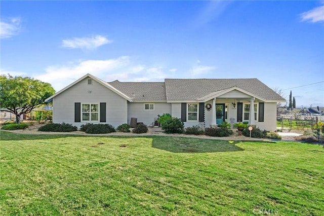 single story home with a front yard