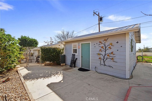 rear view of house featuring a patio