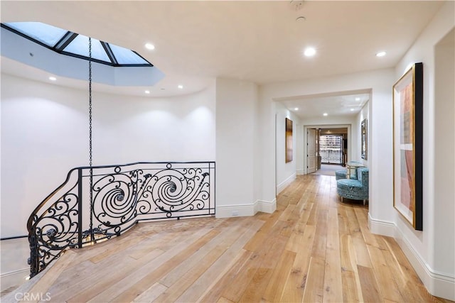 hallway featuring light hardwood / wood-style flooring