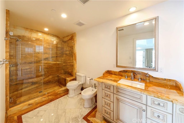 bathroom featuring vanity, toilet, a bidet, and a shower with shower door