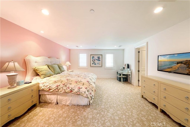 bedroom with light carpet