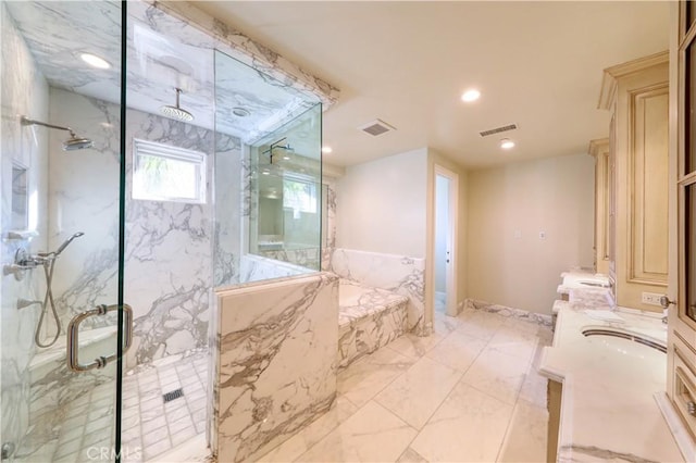 bathroom with vanity and walk in shower