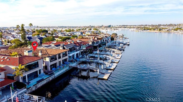 drone / aerial view with a water view