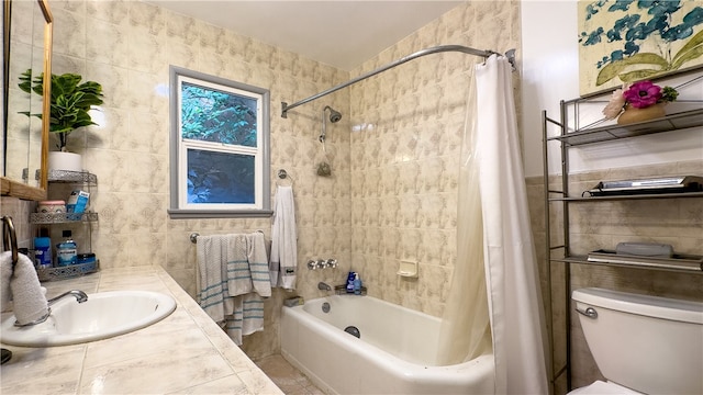 full bathroom with toilet, shower / bath combo, tile walls, tile flooring, and sink