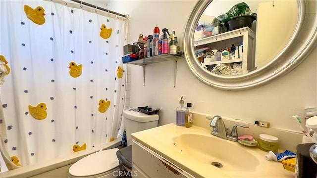 full bathroom featuring shower / tub combo, toilet, and large vanity