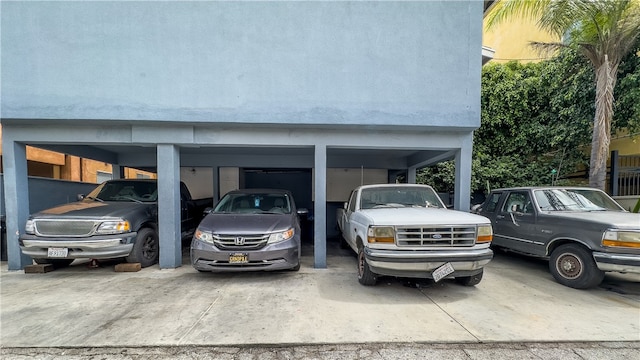 view of car parking featuring a carport