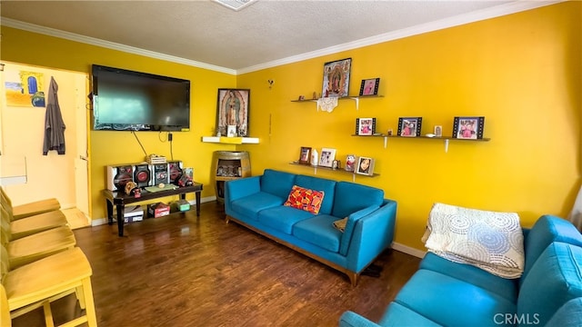 living room featuring dark hardwood / wood-style flooring, crown molding, and a textured ceiling