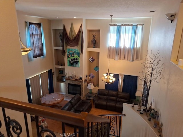 living room featuring an inviting chandelier