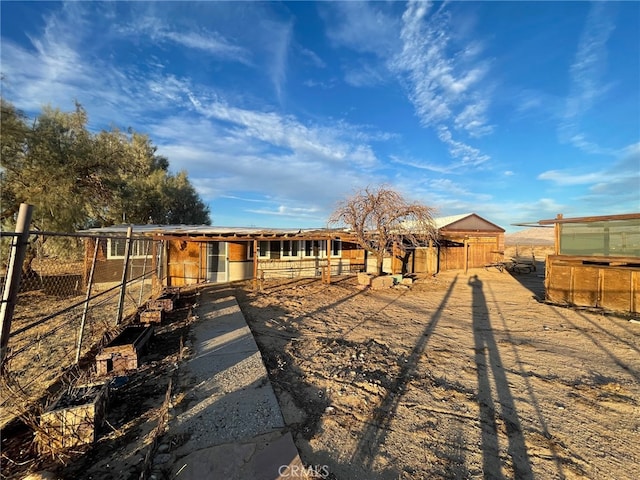 view of front of home with an outbuilding