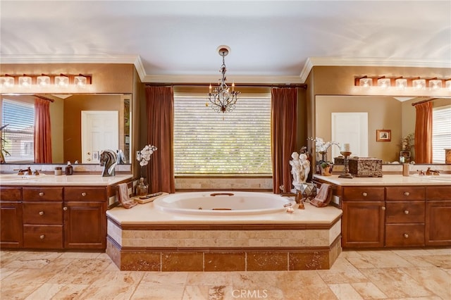 bathroom featuring vanity, a wealth of natural light, crown molding, and tiled tub