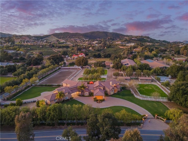 aerial view at dusk with a mountain view