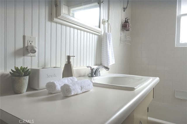 bathroom featuring sink and a bathing tub