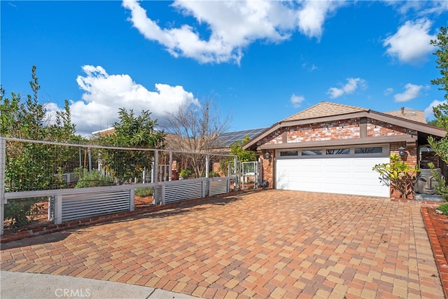 single story home with a garage