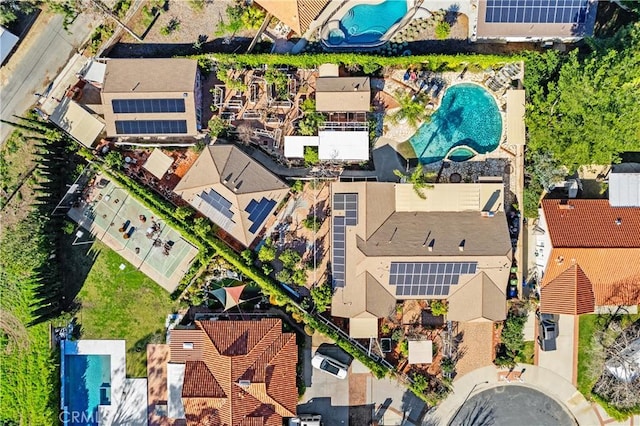 birds eye view of property with a residential view