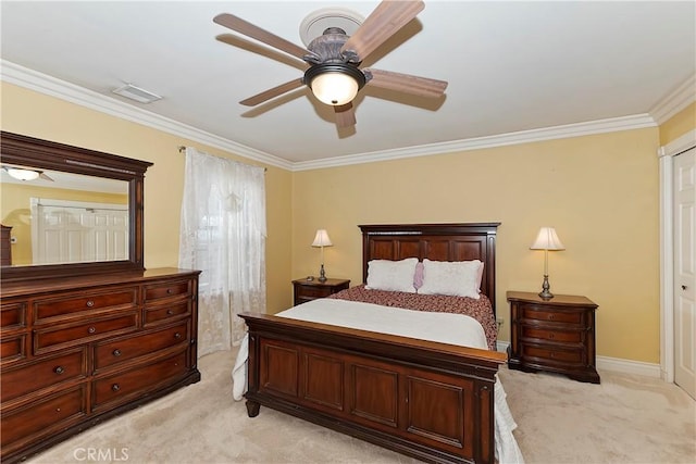 bedroom with crown molding, light carpet, and visible vents