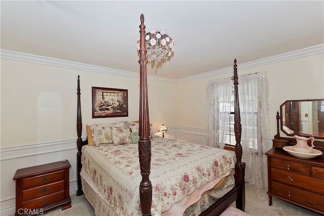 bedroom with light carpet and ornamental molding