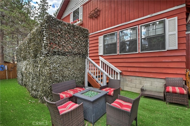 view of patio / terrace with a fire pit