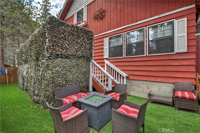 exterior space with a fire pit