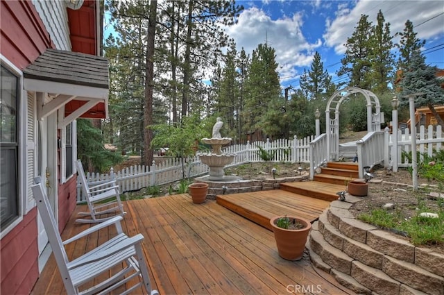 wooden deck featuring fence