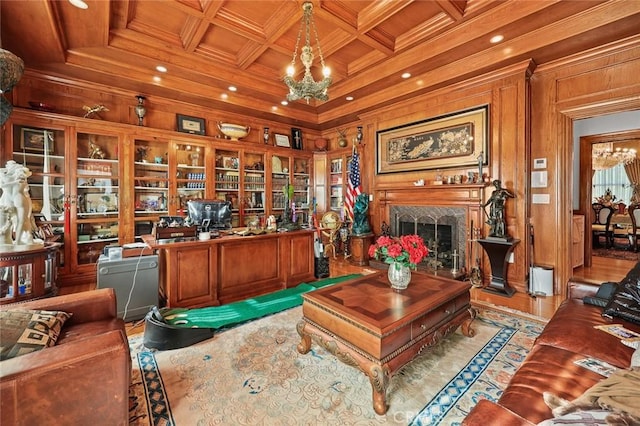 office area with wood ceiling, a fireplace, a chandelier, and coffered ceiling